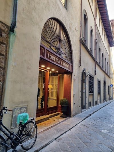 LORETTA CAPONI